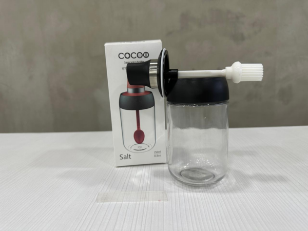 Frasco de vidrio con pincel
